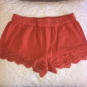 Orange knit short with fringe